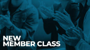 Audience applauding at a new member class