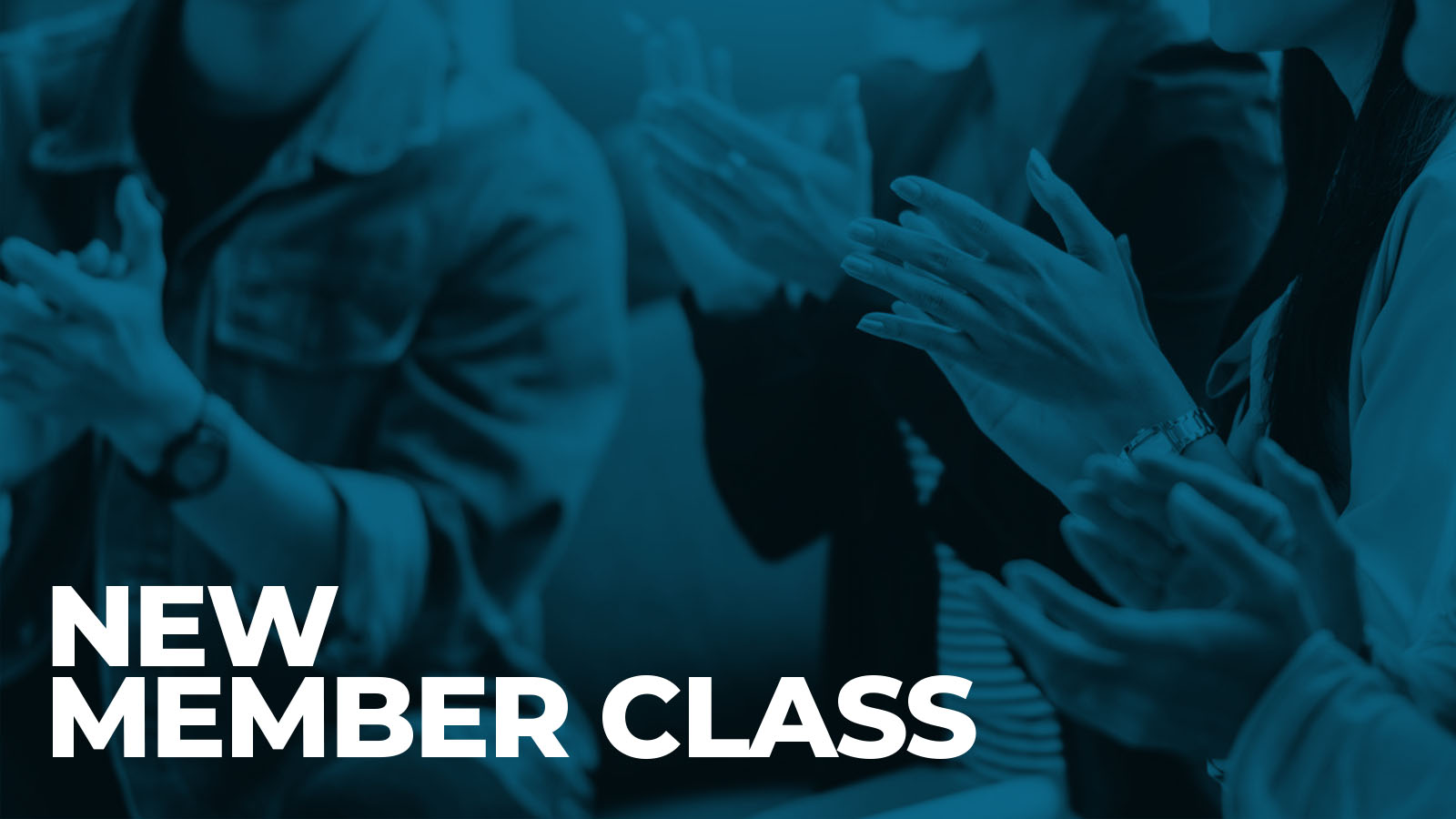 Audience applauding at a new member class